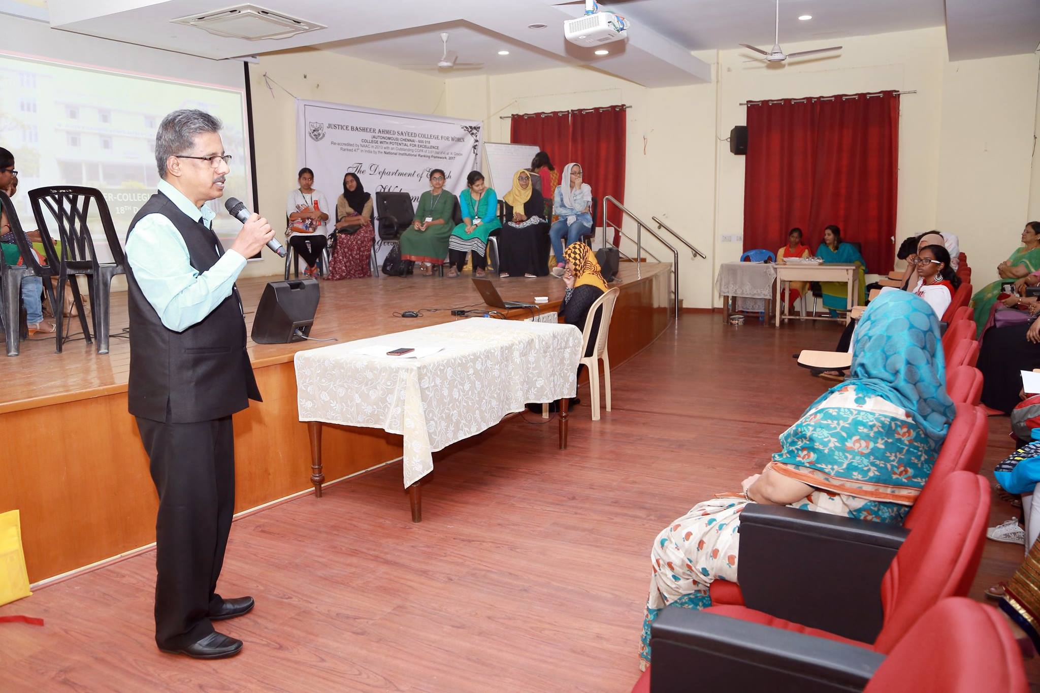 Dr. Sundararaman conducting Inter-Collegiate Quiz at JBAS College